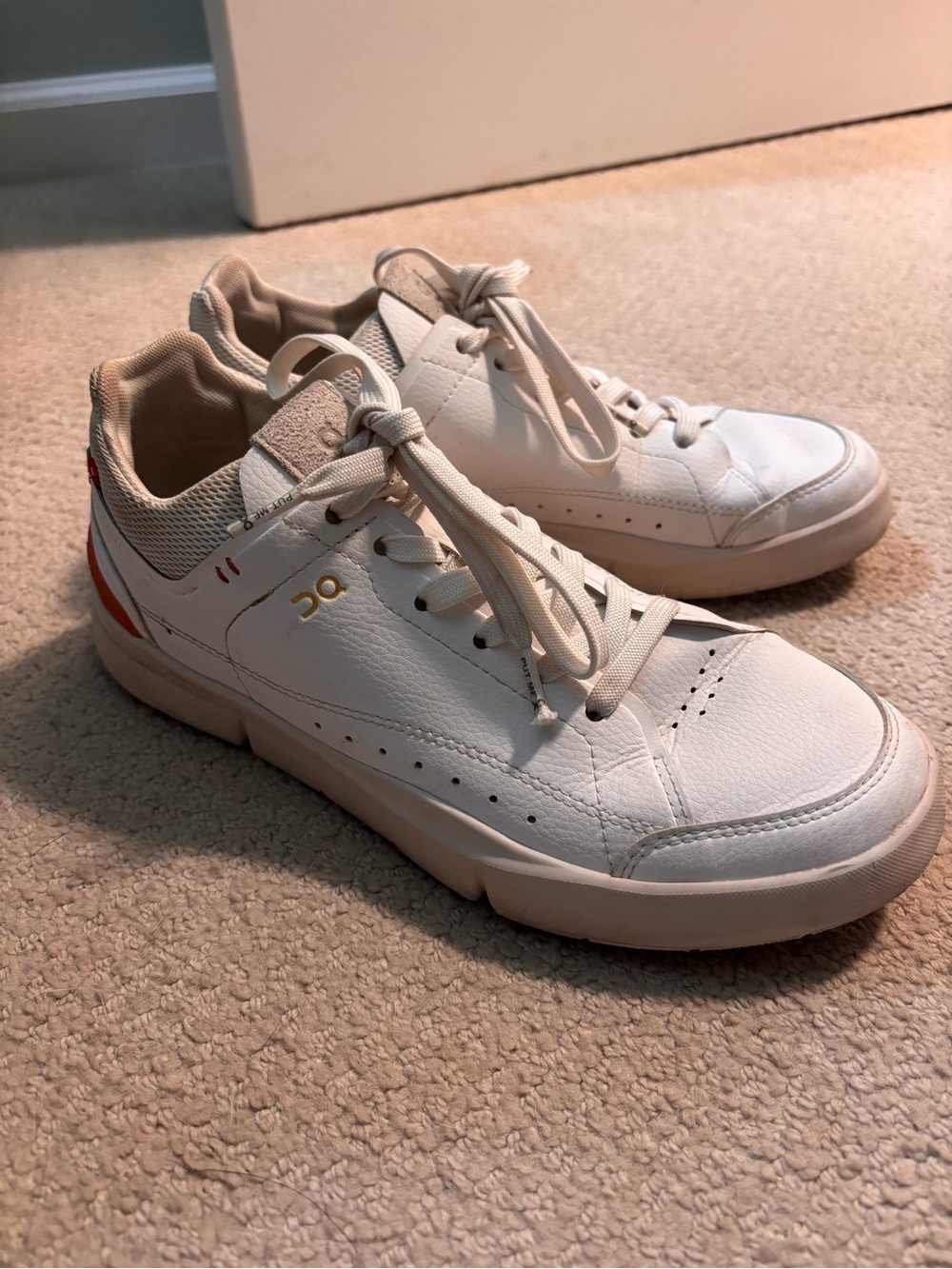 On Running White Men’s Low-Top Leather Sneakers with Subtle Red Accent